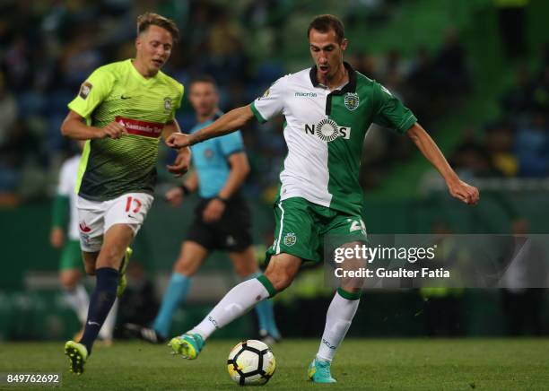 Sporting CP midfielder Radosav Petrovic from Serbia with CS Maritimo forward Viktor Lundberg from Sweden in action during the Portuguese League Cup...