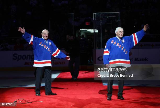 Former New York Ranger players Andy Bathgate and Harry Howell have their numbers retired by the team prior to the game between the Toronto Maple...