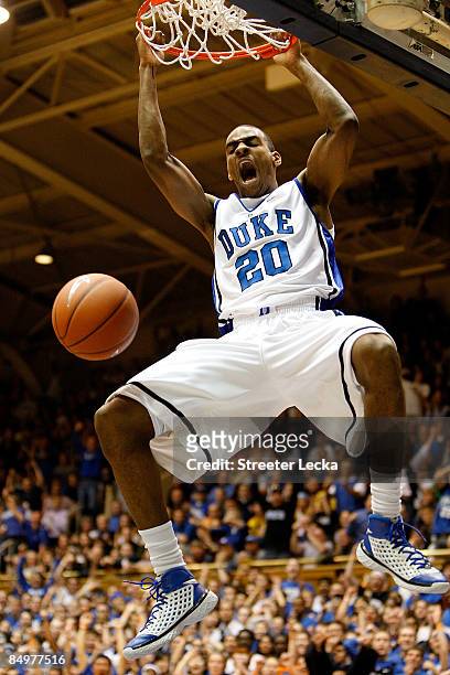 Elliot Williams of the Duke Blue Devils reacts as he dunks the ball against the Wake Forest Demon Deacons during their game at Cameron Indoor Stadium...