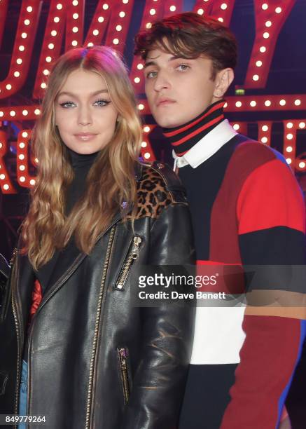 Gigi Hadid and Anwar Hadid attend the Tommy Hilfiger TOMMYNOW Fall 2017 Show during London Fashion Week September 2017 at The Roundhouse on September...