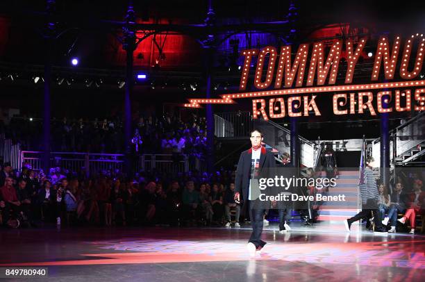 Model walks the runway at the Tommy Hilfiger TOMMYNOW Fall 2017 Show during London Fashion Week September 2017 at The Roundhouse on September 19,...