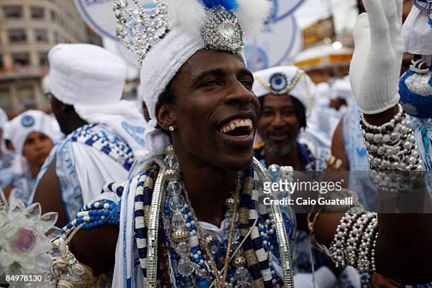 Member of the Filhos de Gandhy carnival group reacts as he and his peers parade in Salvador's downtown streets on February 22, 2009 in Salvador,...