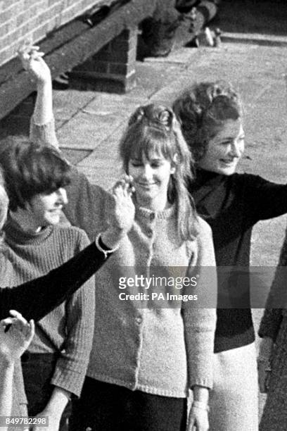 Debutante Felicity Loxton-Peacock, waving from a rooftop during a Berkeley Debutante Dress Show in London. She is the mother of Conservative...