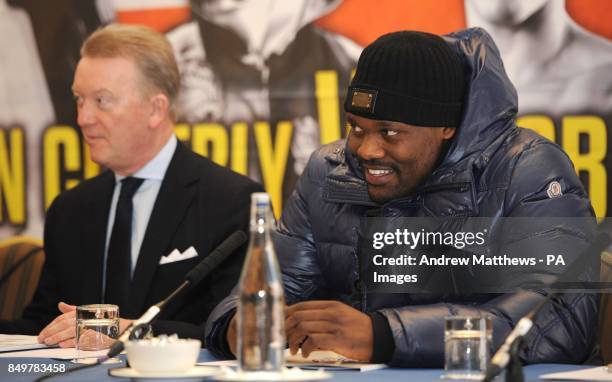 Promoter Frank Warren with boxer Dereck Chisora during the press conference at the Landmark Hotel, London.