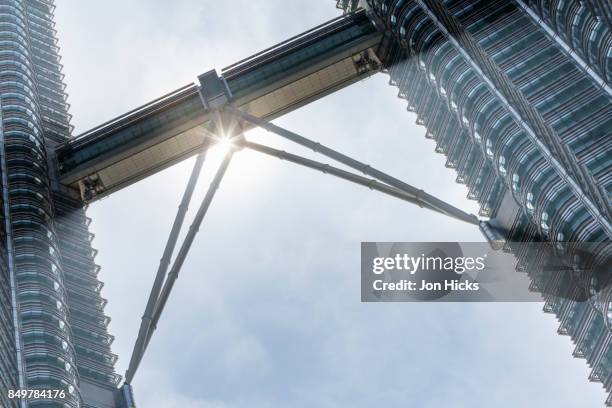 the skybridge linking the petronis towers on the 41st floor. - skybridge petronas twin towers stock pictures, royalty-free photos & images