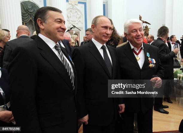 Russian President Vladimir Putin , actor Vladimir Vinokur and billionaire Aras Agalarov seen during an awarding ceremony in the Kremlin in Moscow,...
