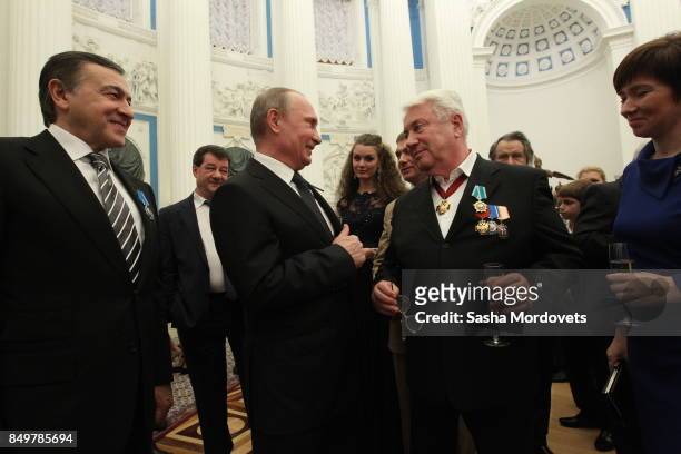 Russian President Vladimir Putin , actor Vladimir Vinokur and billionaire Aras Agalarov seen during an awarding ceremony in the Kremlin in Moscow,...