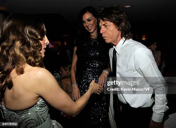 Actress Sarah Jessica Parker, designer L'Wren Scott and musician Mick Jagger attend the 2009 Vanity Fair Oscar party hosted by Graydon Carter at the...