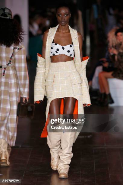 Model walks the runway at the Natasha Zinko show during London Fashion Week September 2017 on September 19, 2017 in London, England.