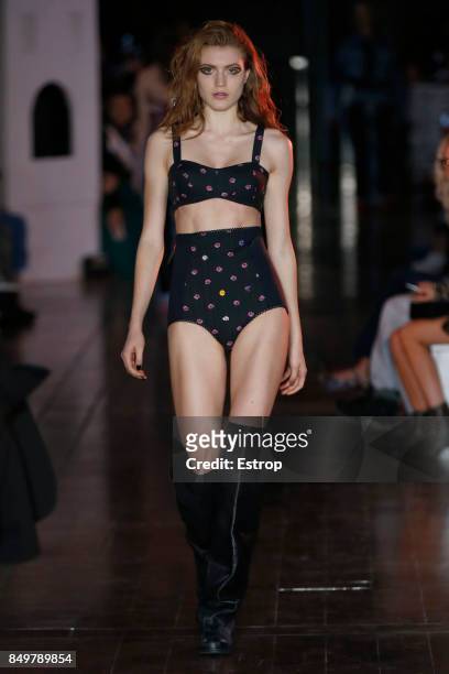Model walks the runway at the Natasha Zinko show during London Fashion Week September 2017 on September 19, 2017 in London, England.