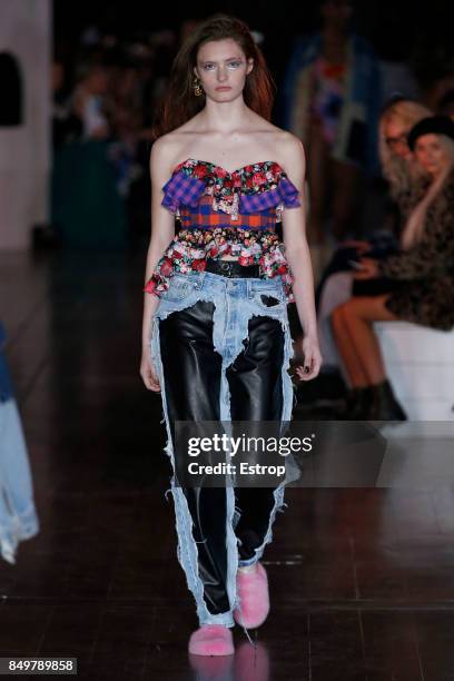 Model walks the runway at the Natasha Zinko show during London Fashion Week September 2017 on September 19, 2017 in London, England.