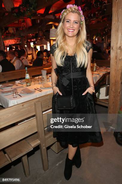 Jennifer Knaeble wearing a dirndl by 'Alpenherz' during the "Alpenherz Wies'n" as part of the Oktoberfest at Theresienwiese on September 19, 2017 in...