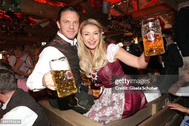 Stefan Mross and his girlfriend Anna-Carina Woitschack during the "Alpenherz Wies'n" as part of the Oktoberfest at Theresienwiese on September 19,...