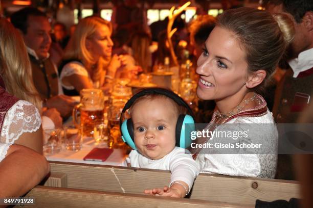 Melissa Hannawald and her son Glen during the "Alpenherz Wies'n" as part of the Oktoberfest at Theresienwiese on September 19, 2017 in Munich,...