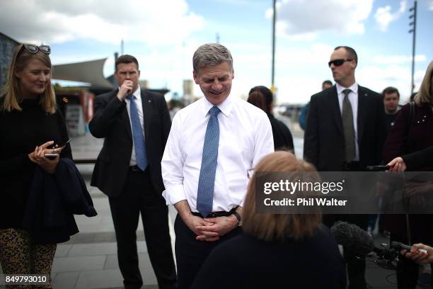 Prime Minister Bill English walks through Auckland's Viaduct Harbour on September 20, 2017 in Auckland, New Zealand. Voters head to the polls on...