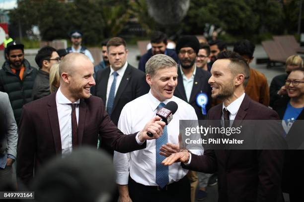 Prime Minister Bill English speaks with Bill and Ben as he walks through Auckland's Viaduct Harbour on September 20, 2017 in Auckland, New Zealand....