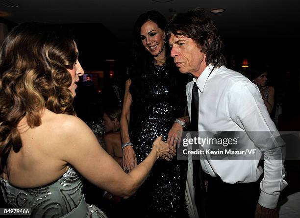 Actress Sarah Jessica Parker, designer L'Wren Scott and musician Mick Jagger attend the 2009 Vanity Fair Oscar party hosted by Graydon Carter at the...