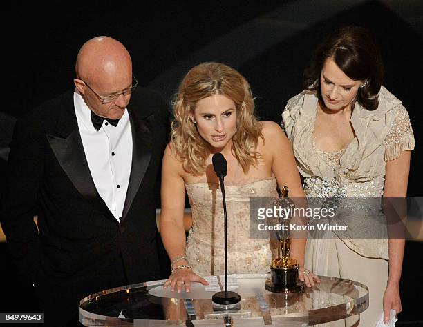 Kate Ledger , sister of late Heath Ledger, accepts the award for Best Supporting Actor for "The Dark Night" with father Kim and mother Sally during...