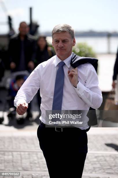 Prime Minister Bill English walks through Auckland's Viaduct Harbour on September 20, 2017 in Auckland, New Zealand. Voters head to the polls on...