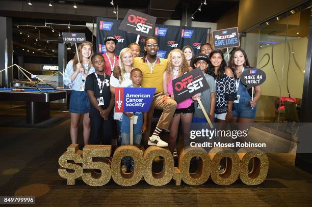 Recording artist Offset pose for photo with fans to launch the $500K fundraising campaign for the American Cancer Society on September 19, 2017 at...