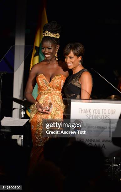 Sade Baderinwa presents an award to The Award for Innovation and Technology honoree Chief Brand Officer, Uber Bozoma Saint John during The...