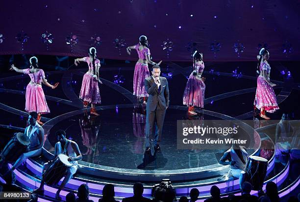 Singer John Legend performs Jai Ho and O Saya from the movie "Slumdog Millionaire" during the 81st Annual Academy Awards held at Kodak Theatre on...