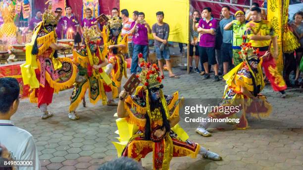 street performers dress up to imitate the ghost and gods during hungry ghost festival - hungry ghost festivals in malaysia stock pictures, royalty-free photos & images
