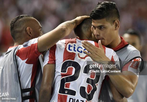 Luis Diaz Marulanda of Junior celebrates with teammates after scoring the first goal of his team during a second leg match between Junior and Cerro...