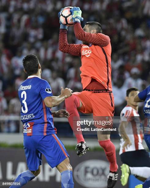 Antony Silva goalkeeper of Cerro Porteño catches the ball during a second leg match between Junior and Cerro Porteño as part of round of 16 of Copa...