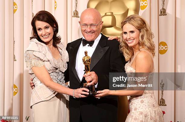 Family of late actor Heath Ledger, father Kim Ledger , mother Sally and sister Kate , pose in the press room after accepting the award for Best...