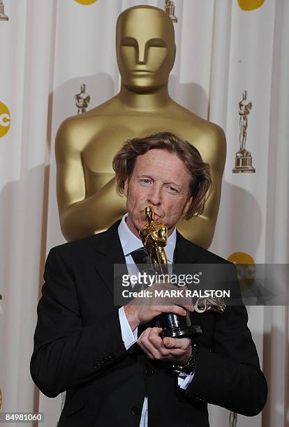 Winner for Best Cinematography in "Slumdog Millionaire" Anthony Dod Mantle kisses his Oscar at the 81st Academy Awards at the Kodak Theater in...