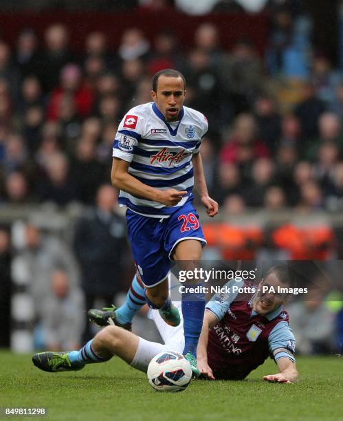 Aston Villa's Ron Vlaar and Queens Park Rangers' Andros Townsend battle for the ball