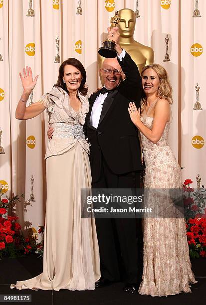 Family of late actor Heath Ledger, father Kim Ledger , mother Sally and sister Kate , pose in the press room after accepting the award for Best...