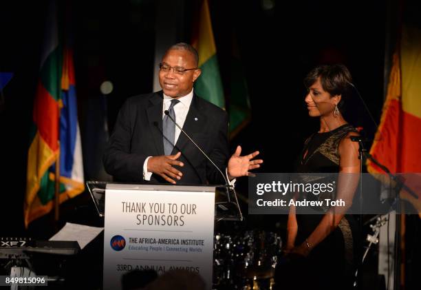 MCs Ben Dotsei Malor and Sade Baderinwa speak during The Africa-America Institute 33rd Annual Awards Gala at Mandarin Oriental New York on September...