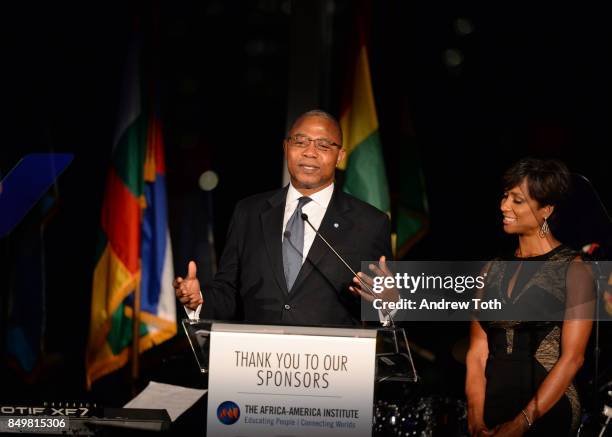 MCs Ben Dotsei Malor and Sade Baderinwa speak during The Africa-America Institute 33rd Annual Awards Gala at Mandarin Oriental New York on September...