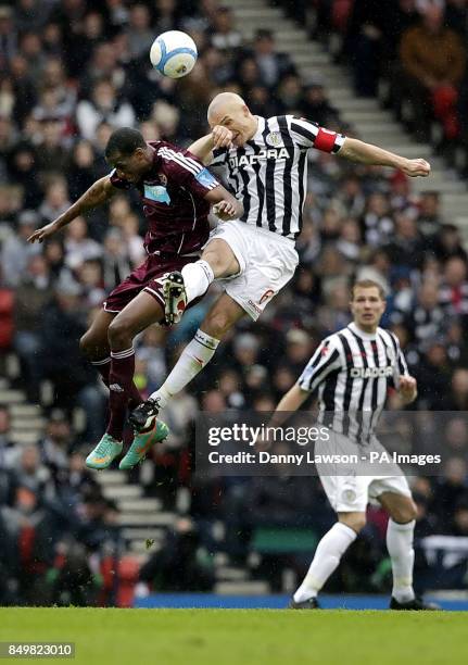 Heart's Michael Ngoo and St Mirren's Jim Goodwin fight for the ball during the Scottish Communities League Cup Final at Hampden Park, Glasgow.