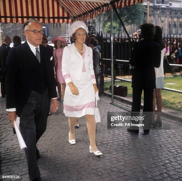 Crown Princess Beatrix of the Netherlands arrives at Westminster Abbey for the wedding of Lady Elizabeth Anson and Sir Geoffrey Shakerley.