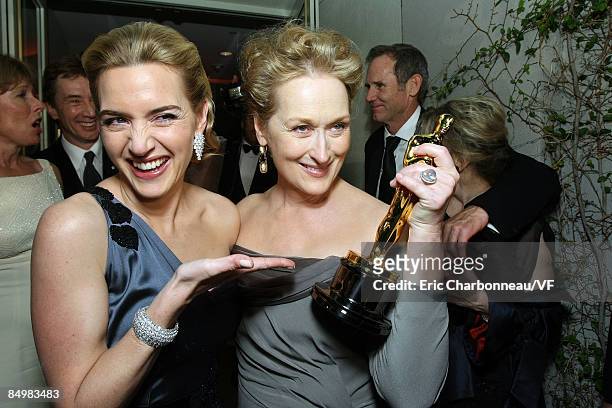 Actress Kate Winslet poses with Meryl Streep and her Oscar at the 2009 Vanity Fair Oscar party hosted by Graydon Carter at the Sunset Tower Hotel on...