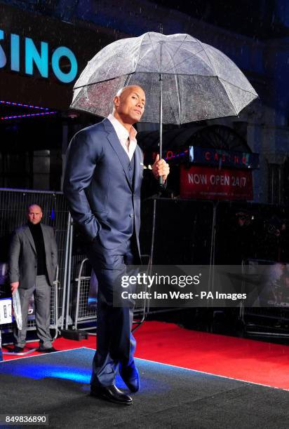 Dwayne 'The Rock' Johnson arrives for the UK premiere of GI Joe: Retaliation at the Empire Cinema in London.