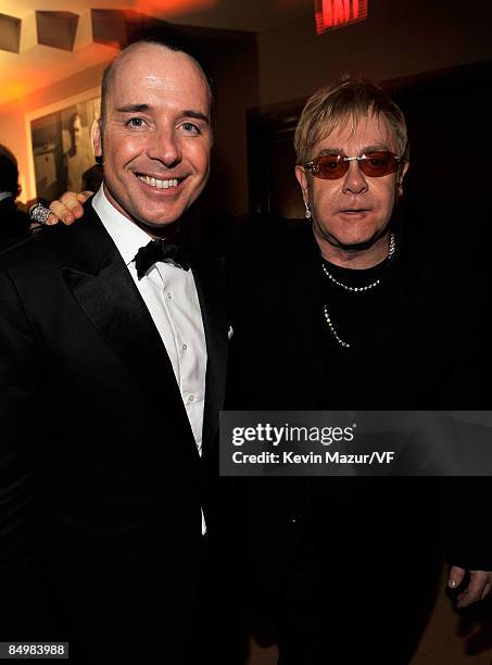 David Furnish and Sir Elton John attends the 2009 Vanity Fair Oscar party hosted by Graydon Carter at the Sunset Tower Hotel on February 22, 2009 in...