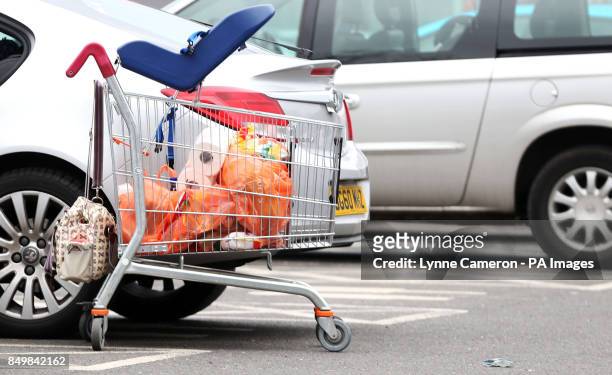 General view of shopping in a trolley outside a Sainsbury's store in Macclesfield after the chain posted better-than-expected sales figures, after a...