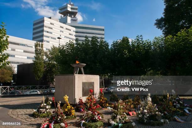 Memorial with an eternal flame and the words Freiheit Recht Friede, German for Freedom Law Peace, Monument to the German. The Theodor-Heuss-Platz is...