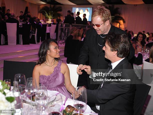 Recording artist Sir Elton John with actor Chris Noth and Tara Wilson at the 17th Annual Elton John AIDS Foundation Oscar party held at the Pacific...