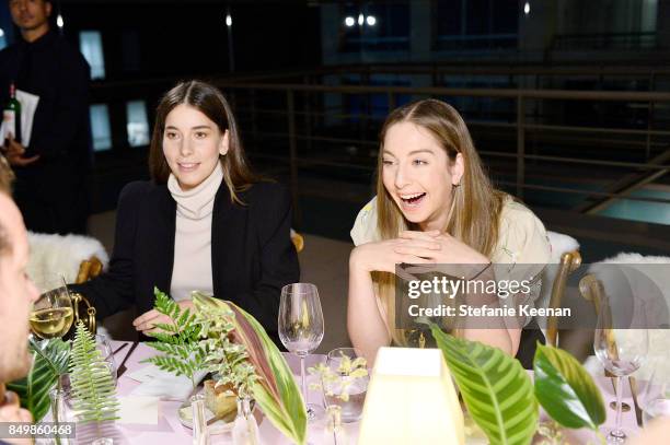 Danielle Haim and Este Haim attend Chloe x MOCA Dinner at MOCA Grand Avenue on September 19, 2017 in Los Angeles, California.