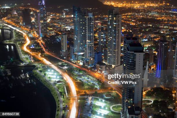 Skyline, Panama City, Panama, Central America by night. Cinta Costera Pacific Ocean Coastal Beltway Bahia de Panama linear park seawall skyline...