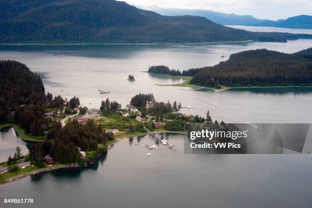 Aerial view of Coastal Mountains, houses, and glaciers north of Juneau, Southeast Alaska. Juneau has an amazing number of fully accessible mountains...