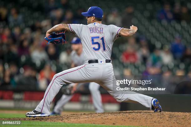 Reliever Matt Bush of the Texas Rangers delivers a pitch during the eighth inning of a game against the Seattle Mariners at Safeco Field on September...