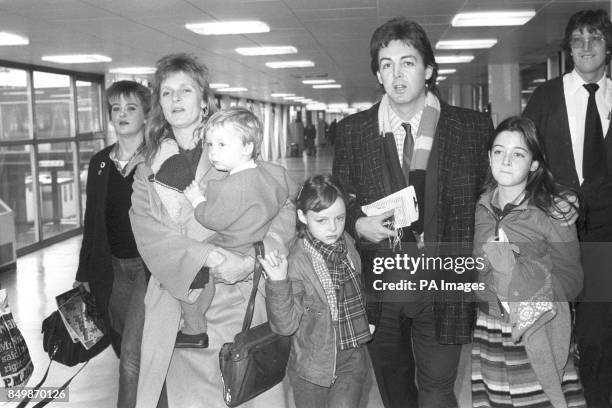 Former Beatles star Paul McCartney with his wife Linda and members of their family, Heather James Stella and Mary at Heathrow Airport in London as...