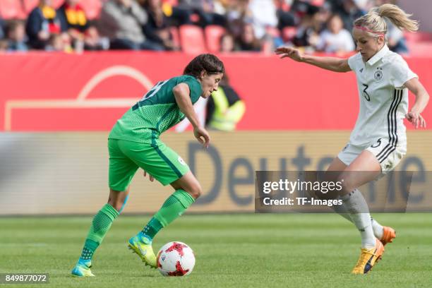 Mateja Zver of Slovenia and Kathrin Hendrich of Germany battle for the ball during the 2019 FIFA women's World Championship qualifier match between...