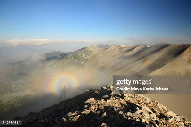 brocken spectre, pirin mountain, vihren peak, bulgaria, europe - brocken spectre stock pictures, royalty-free photos & images